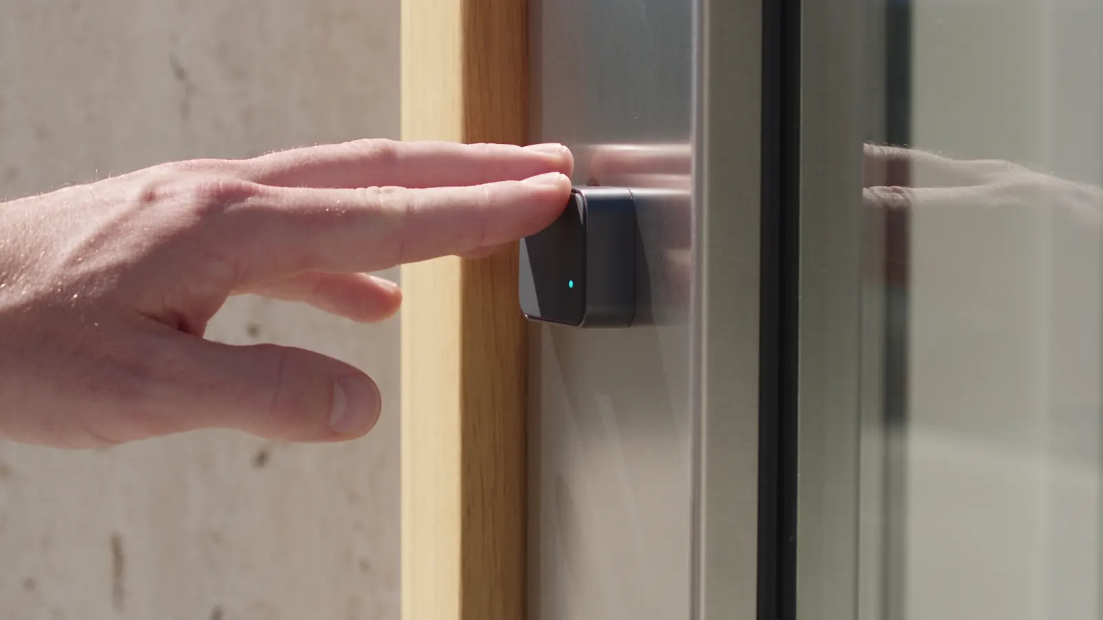 Concept illustration of fingerprint access at a commercial doorway.