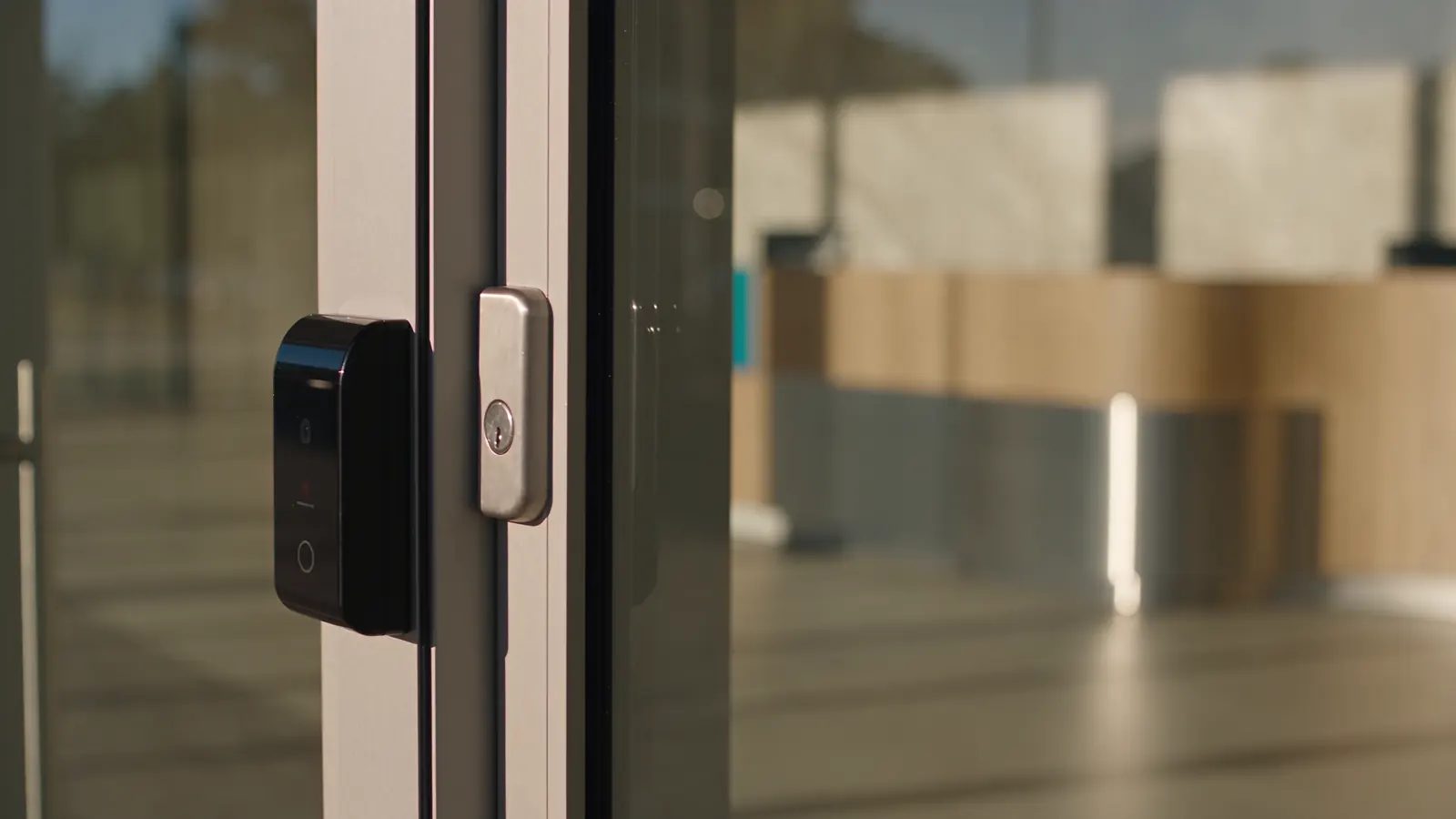 Concept illustration of a professionally integrated access reader at a commercial entrance.